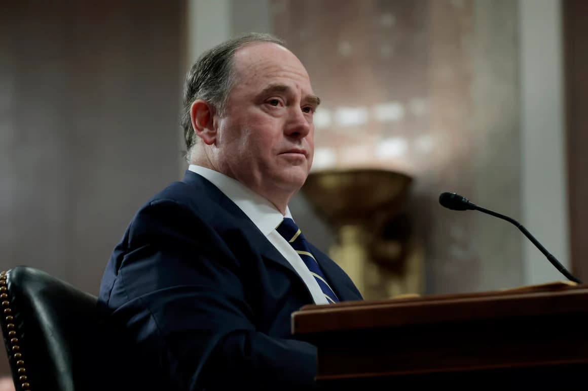 US Navy Secretary John Phelan speaking at a Pentagon hearing during ongoing Iran-related naval operations